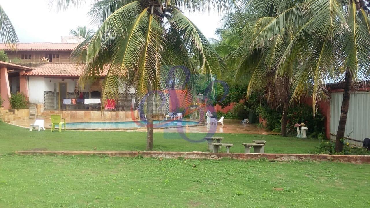Ampla casa com 5 suítes, piscina e deck com churrasqueira no Porto das Dunas!