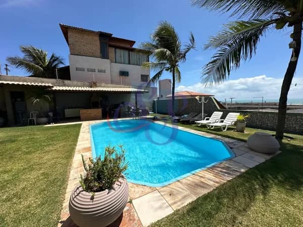 Belíssima casa no Porto das Dunas com 5 suítes