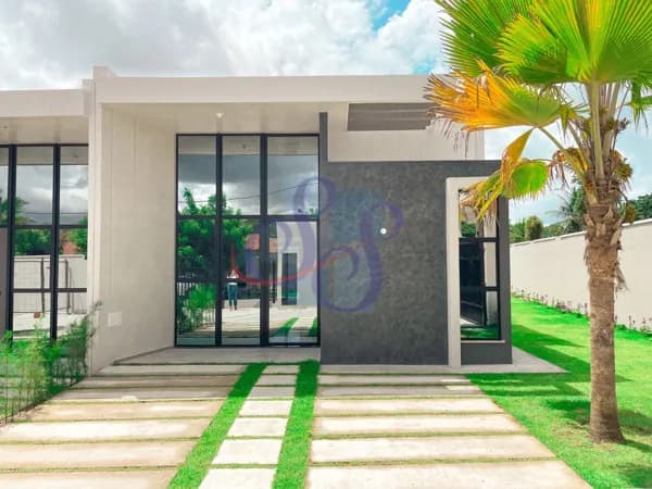 Casa plana com 3 suítes em condomínio no Eusébio.
