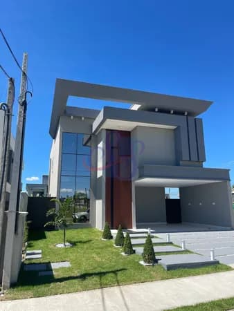 Linda casa com 4 suítes na Cidade Alpha, terras 2