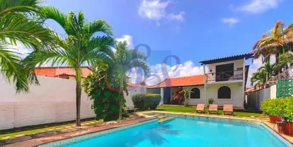 Casa duplex no Porto das Dunas com 6 dormitórios, piscina privativa.