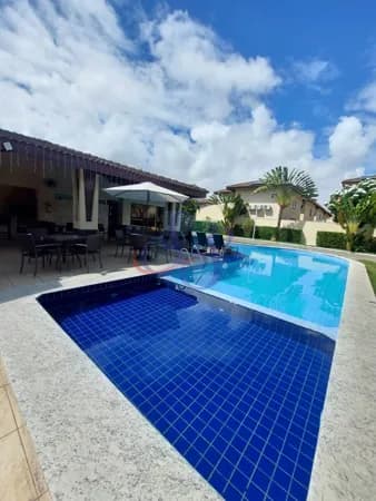 Linda casa em condomínio fechado com 4 suítes