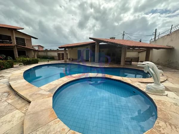Casa duplex em condomínio com 4 suítes - Porto das Dunas
