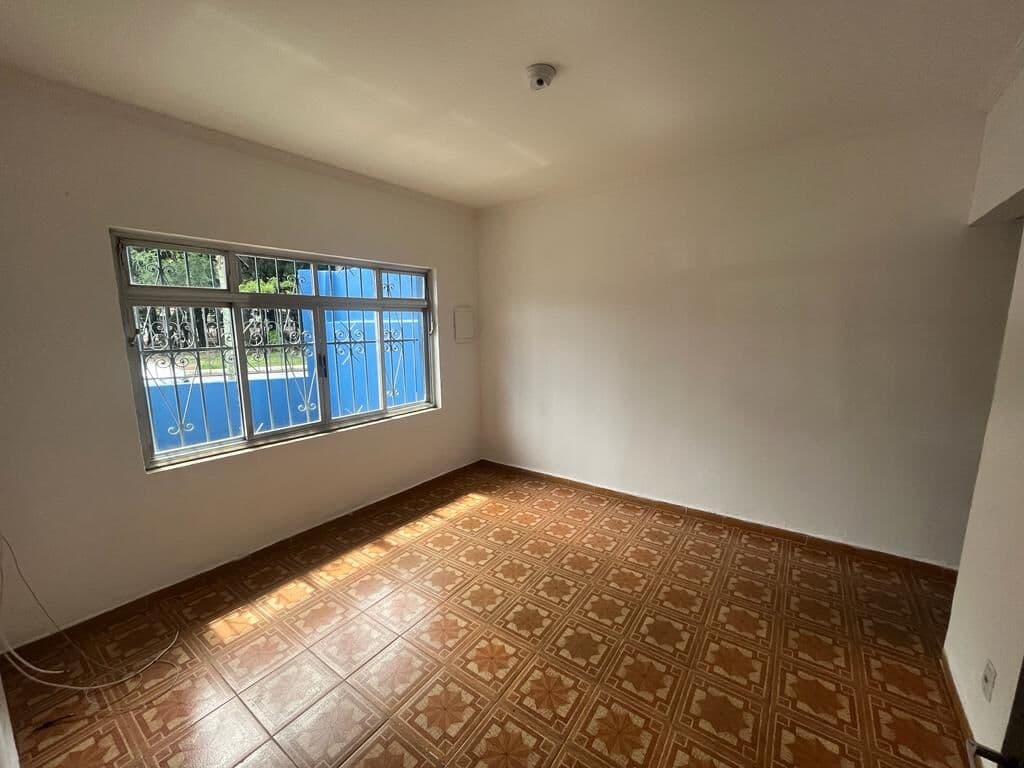 Casa com edícula