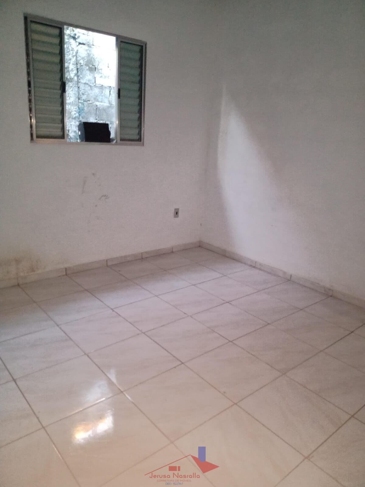 Terreno com 03 casas Quarentenário - São Vicente - SP