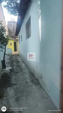 Terreno com casa antiga