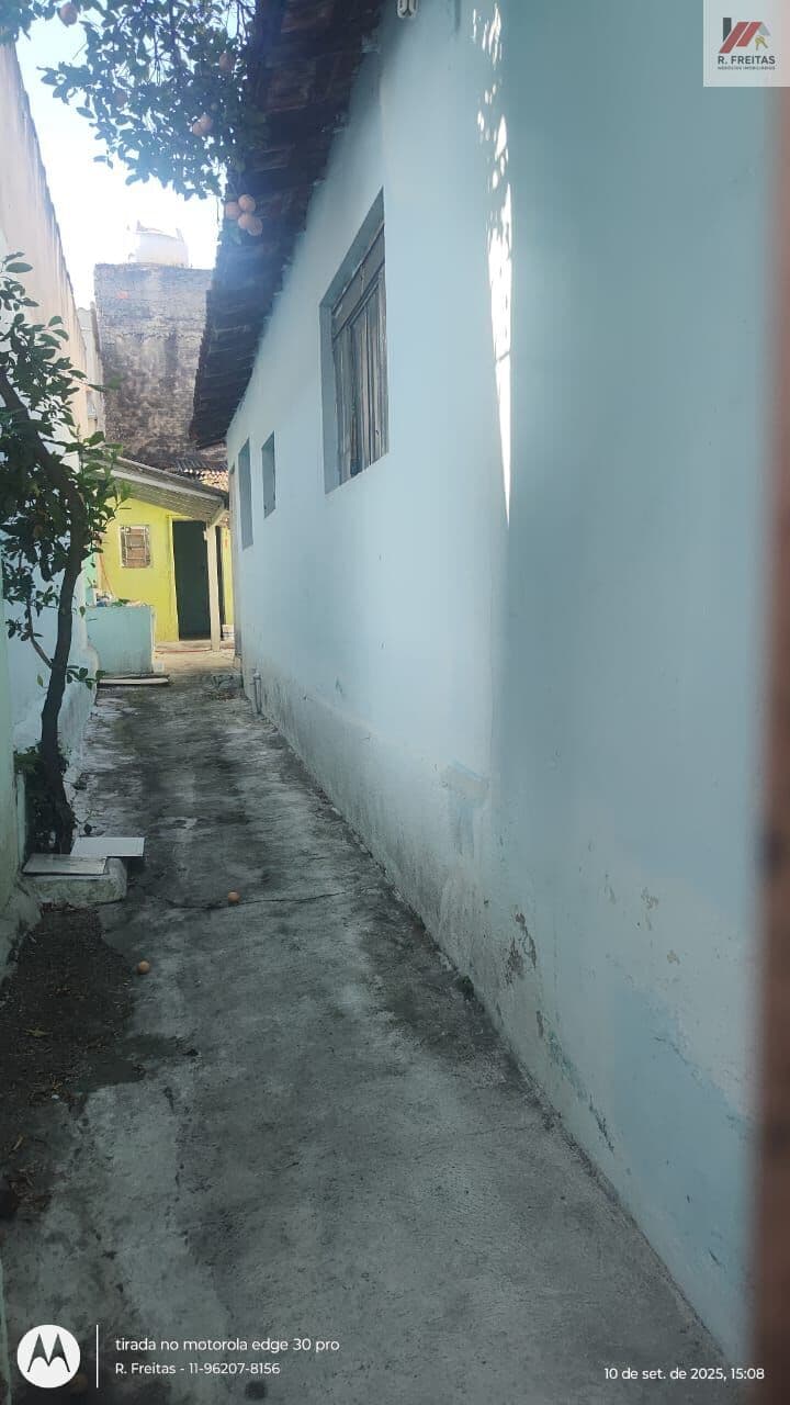 Terreno com casa antiga