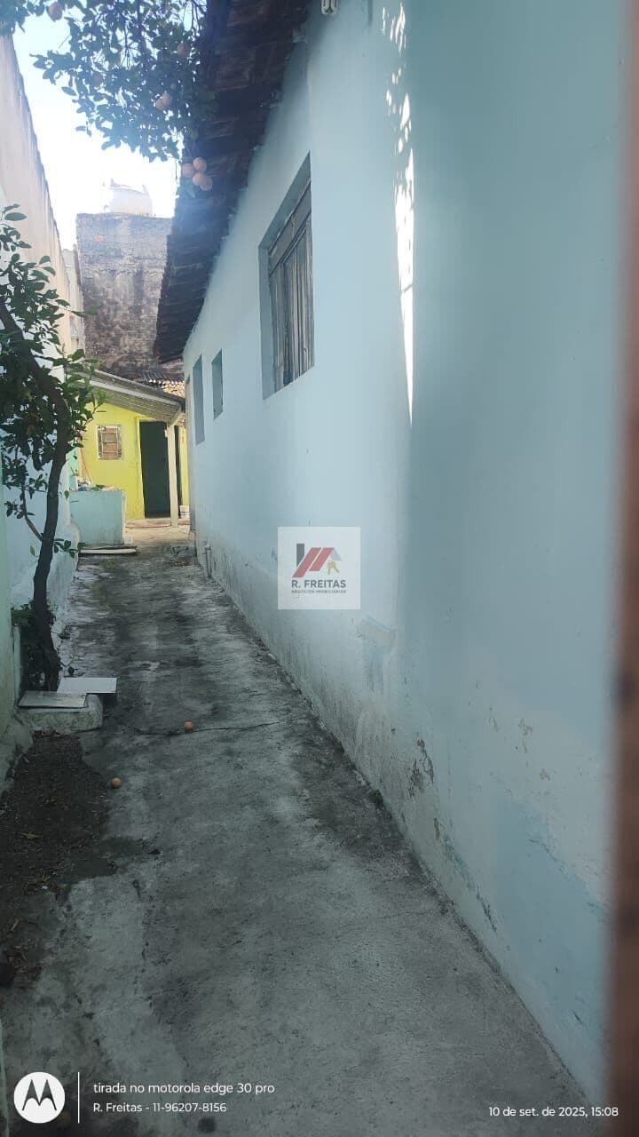 Terreno com casa antiga