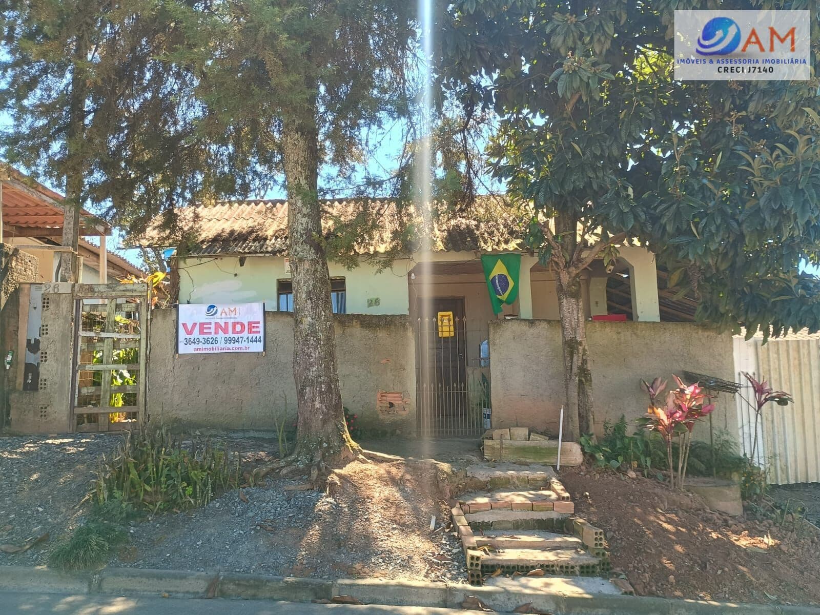 Terreno com Casa Padrão
