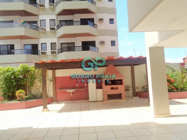 2 dormitórios sendo 1 suíte, sala 2 ambientes, cozinha americana, banheiro social e área de serviço.