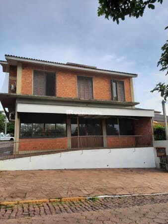 sobrado residencial com sala comercial