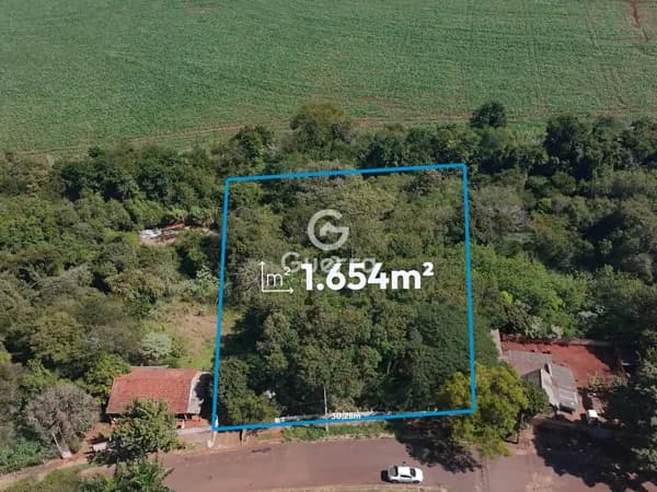 Terreno à venda no Parque Tarumã com córrego aos fundos