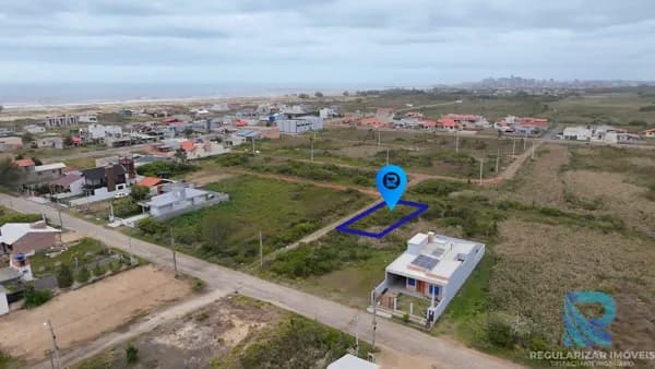 Terreno de esquina 450 metros do mar em Passo de Torres