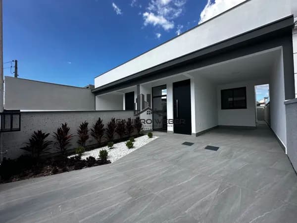 Casa Geminada com 2 Dormitórios - 1 Suíte - Sao José - SC