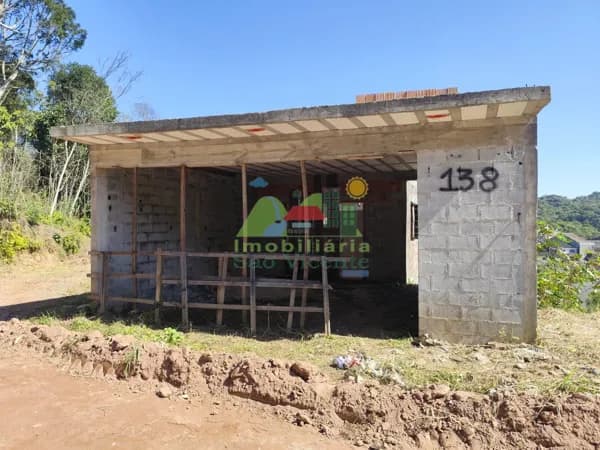 TERRENO COM CONSTRUÇÃO
