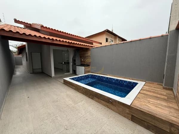 CASA GEMINADA LADO PISTA 600 MTS DO MAR COM PISCINA E CHURRASQUEIRA EM ITANHAÉM!!