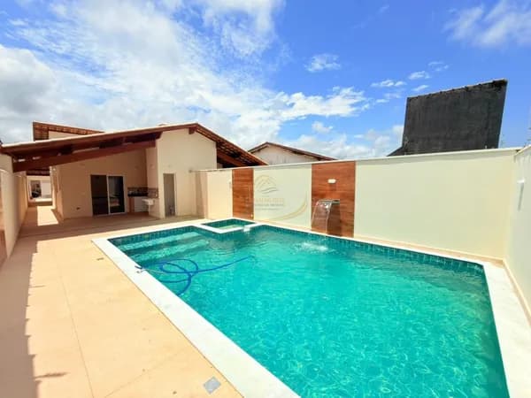 CASA COM TERRENO GRANDE 6X35MTS COM PISCINA 4X7 METROS LADO PRAIA EM ITANHAÉM!