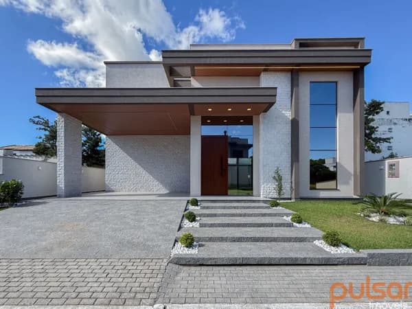 Casa contemporânea em condomínio com quadras de tênis