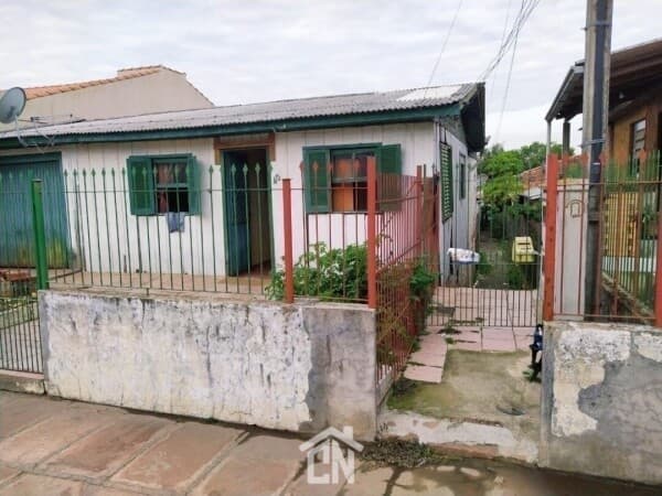Terreno com 3 casas a venda no Bairro Progresso