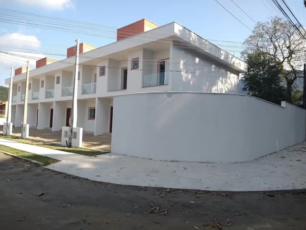 Sobrado novo em Villagio no Massaguaçu em Caraguatatuba ( aceita financiamento bancário)