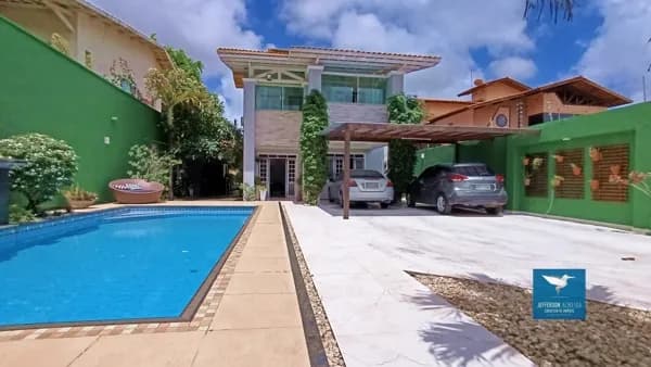 Casa Duplex com Móveis Projetados, Piscina, Deck e Energia Solar em Rua Pública no Bairro Edson Queiroz, Próximo a Av. Edilson Brasil Soares, 260m2, 03 Suítes, Gabinete, Amplo Lote de 435m2, 04 Vagas