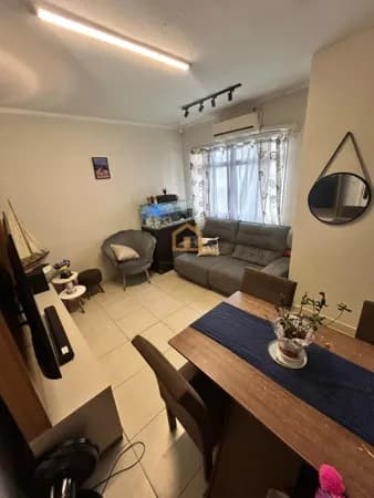 Apartamento em Prédio na Avenida da Praia - Bairro José Menino, em Santos.