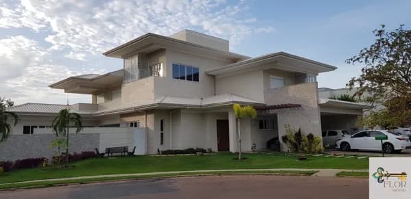Casa em condomínio fechado em Cuiabá com 4 suítes, piscina aquecida e vista definitiva para área verde