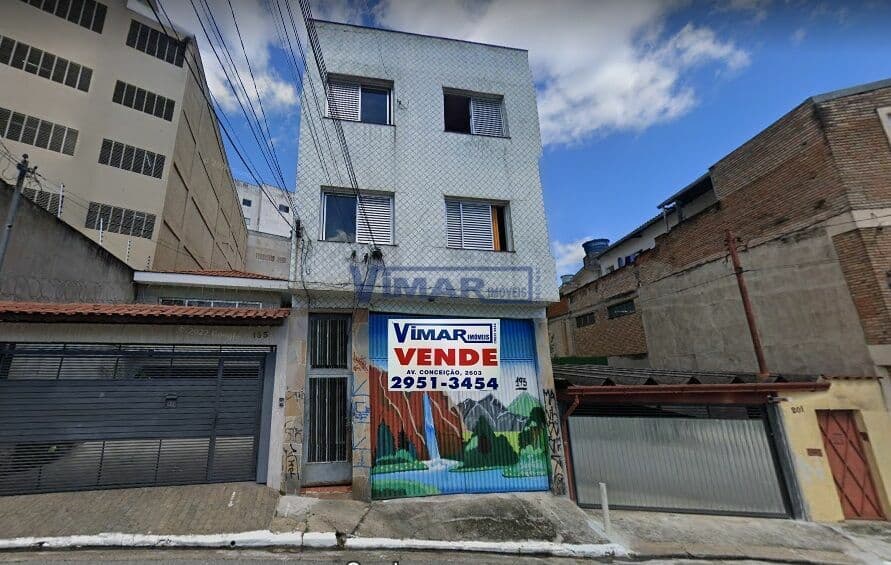 Prédio Residencial para Renda com 845m2 total com 8 casas + salão + terreno nos fundos
