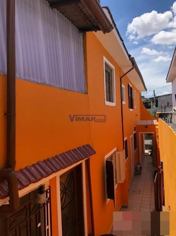 Casa Sobrado com 5 dormitorios, 3 wcs, sala, co0zinha, a. s. 2 vagas de garagem.