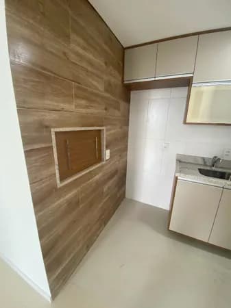 2 dormitórios, suíte, 58m², Churrasqueira, Vaga de garagem escriturada,