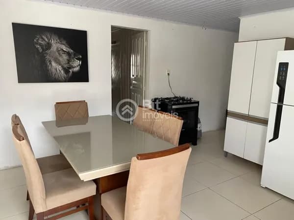 CASA COM TRÊS DORMITÓRIOS