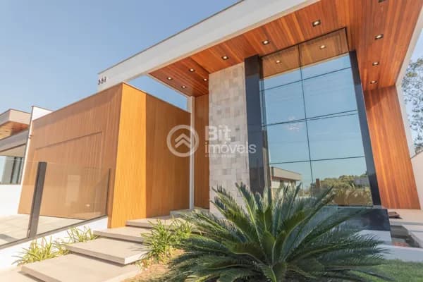 CASA MOBILIADA COM TRÊS DORMITÓRIOS