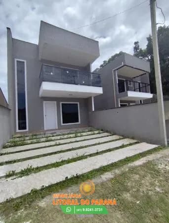 Financiamento com entrada parcelada: Sobrado novo perto da praia Grajaú