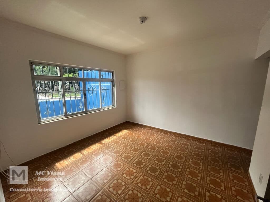 Casa com edícula