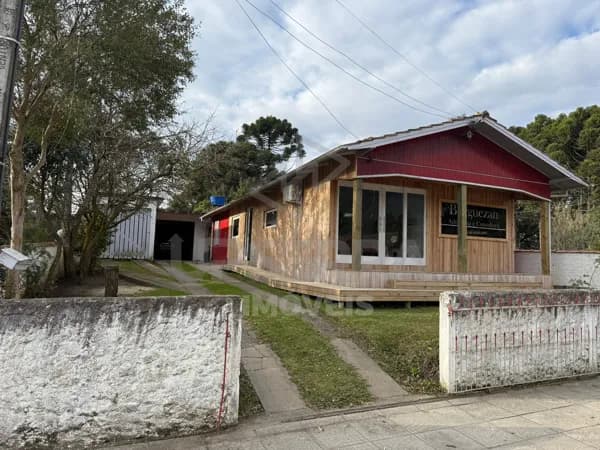 Lote com Casa de Madeira e Edícula – Oportunidade Única