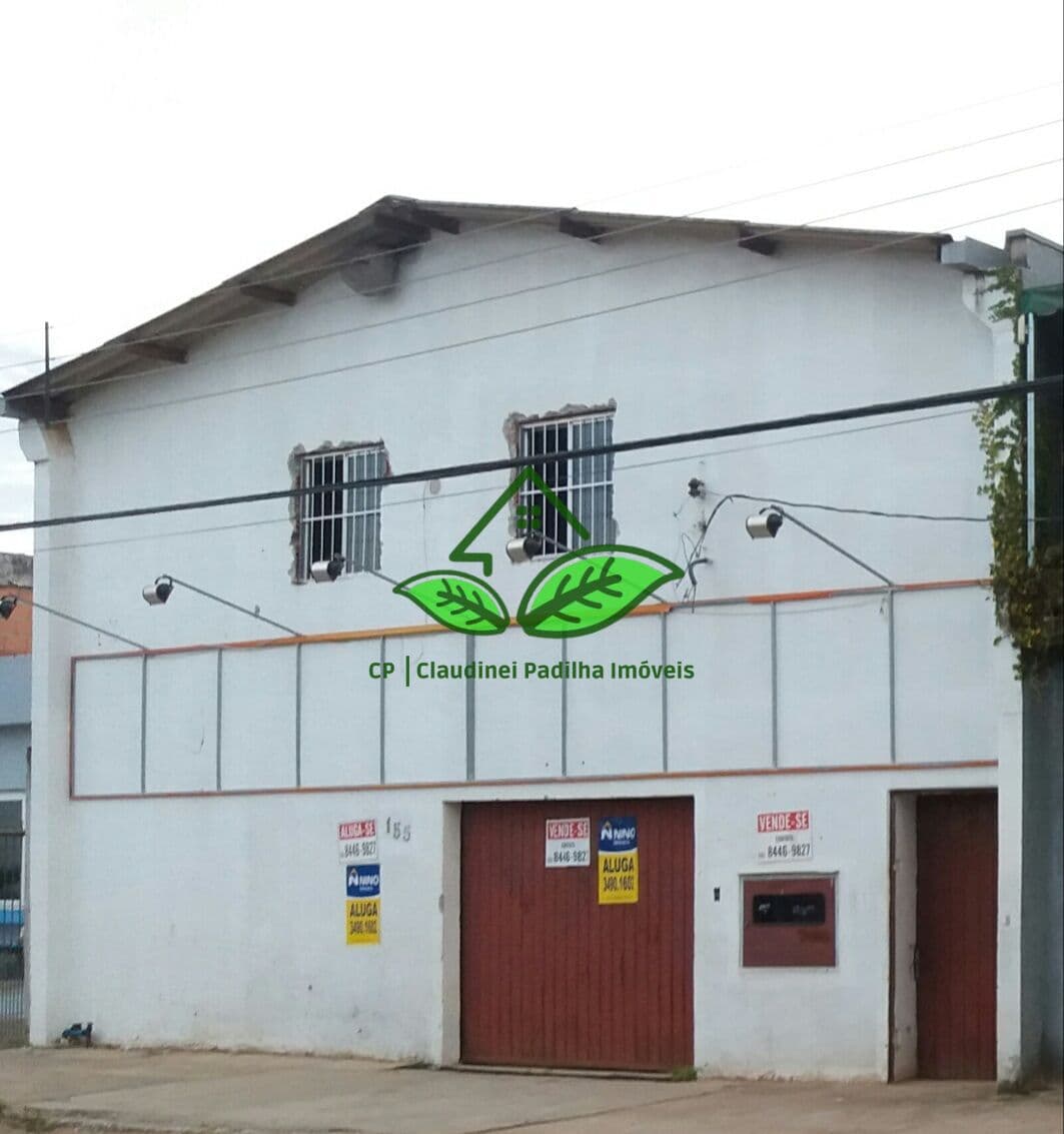 Vende: Pavilhão, escriturado, com duas frentes de rua a 150 m da RS-030 em Gravataí/RS