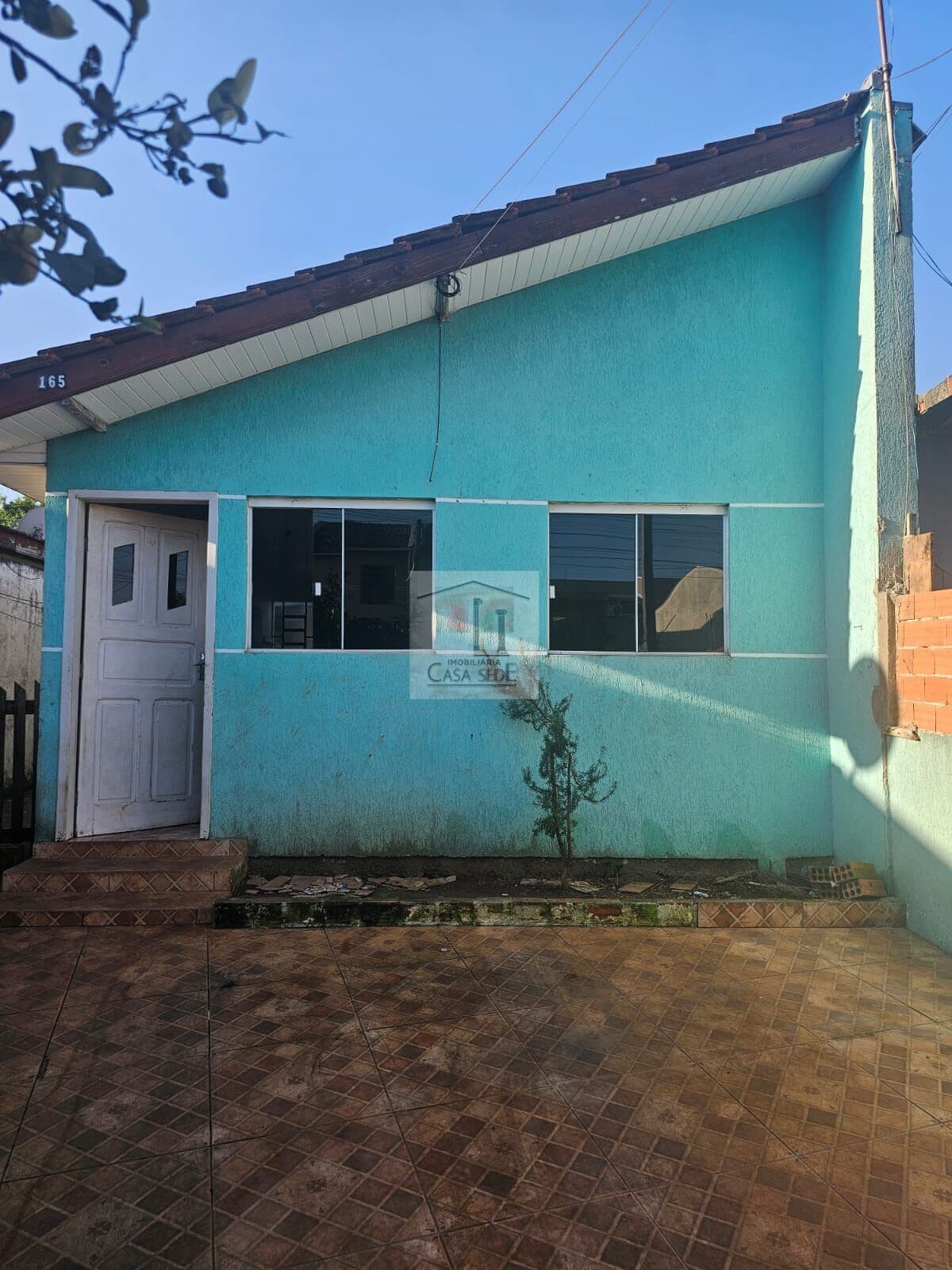 Terreno com 2 casas